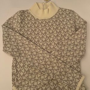 Michael Micheal Kors “Logo Jacquard Mock Neck Dress” search that if you like :)